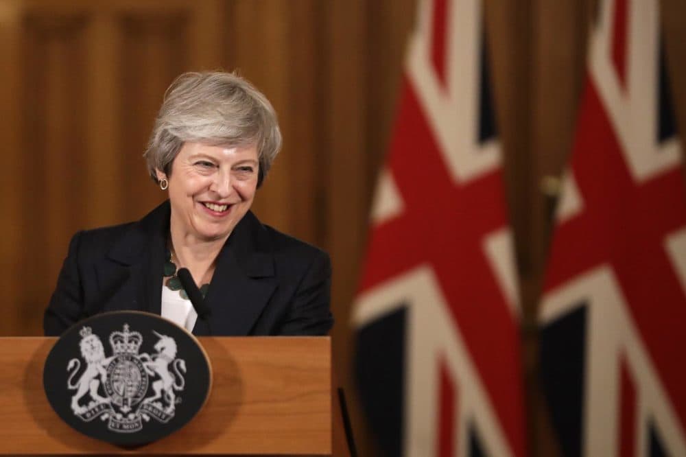 Britain's Prime Minister Theresa May smiles during a press conference inside 10 Downing Street in London, Thursday, Nov. 15, 2018. British Prime Minister Theresa May says if politicians reject her Brexit deal, it will set the country on &quot;a path of deep and grave uncertainty.&quot; Defiant in the face of mounting criticism, May said Thursday she believed &quot;with every fiber of my being&quot; that the deal her government struck with the European Union was the right one. (Matt Dunham, Pool/AP)