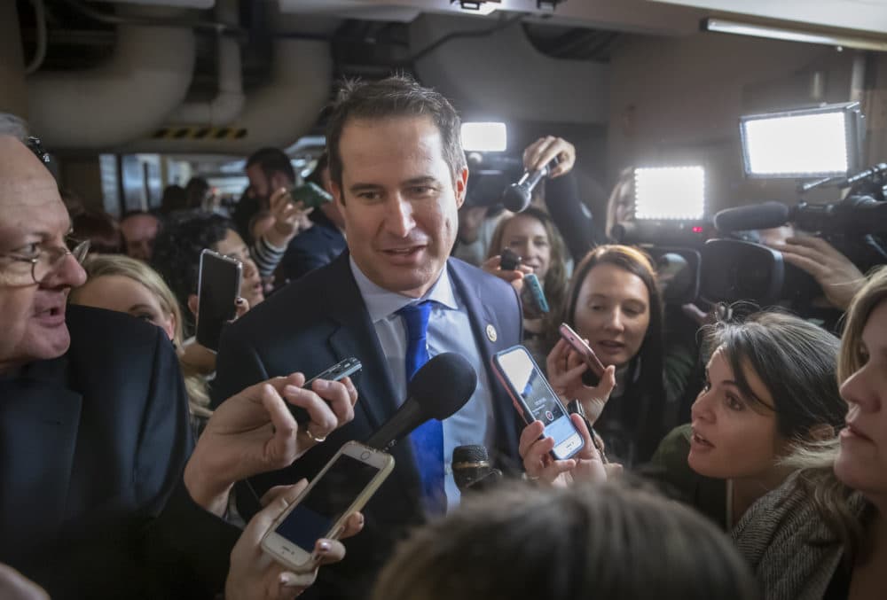 Rep. Seth Moulton D-Mass., is questioned in the basement of the Capitol by reporters on his way to meet with fellow Democrats about his opposition to House Minority Leader Nancy Pelosi, D-Calif., becoming the speaker of the House when the Democrats take the majority in the 116th Congress. (J. Scott Applewhite/AP)