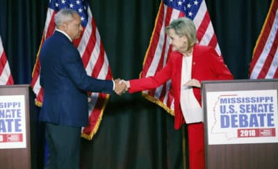 Appointed U.S. Sen. Cindy Hyde-Smith, R-Miss., and Democrat Mike Espy greet each other before their televised Mississippi U.S. Senate debate in Jackson, Miss., Tuesday, Nov. 20, 2018. (Rogelio V. Solis, Pool/AP)