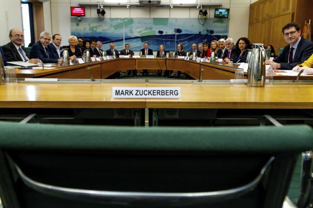 The International Grand Committee with representation from 9 Parliaments and Mark Zuckerberg in non-attendance. Lawmakers from nine countries grilled Facebook executive, Richard Allan, on Tuesday as part of an international hearing at Britain's parliament on disinformation and &quot;fake news.&quot; Facebook's vice president for policy solutions, answered questions in place of his boss, CEO Mark Zuckerberg, who ignored repeated requests to appear. (Gabriel Sainhas/House of Commons via AP)