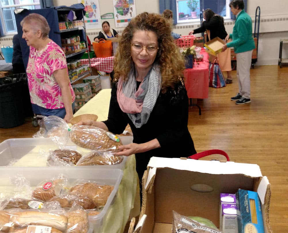 Oliva Llano at the South Congregational Church Community Food Pantry in Pittsfield (Nancy Eve Cohen/NEPR)