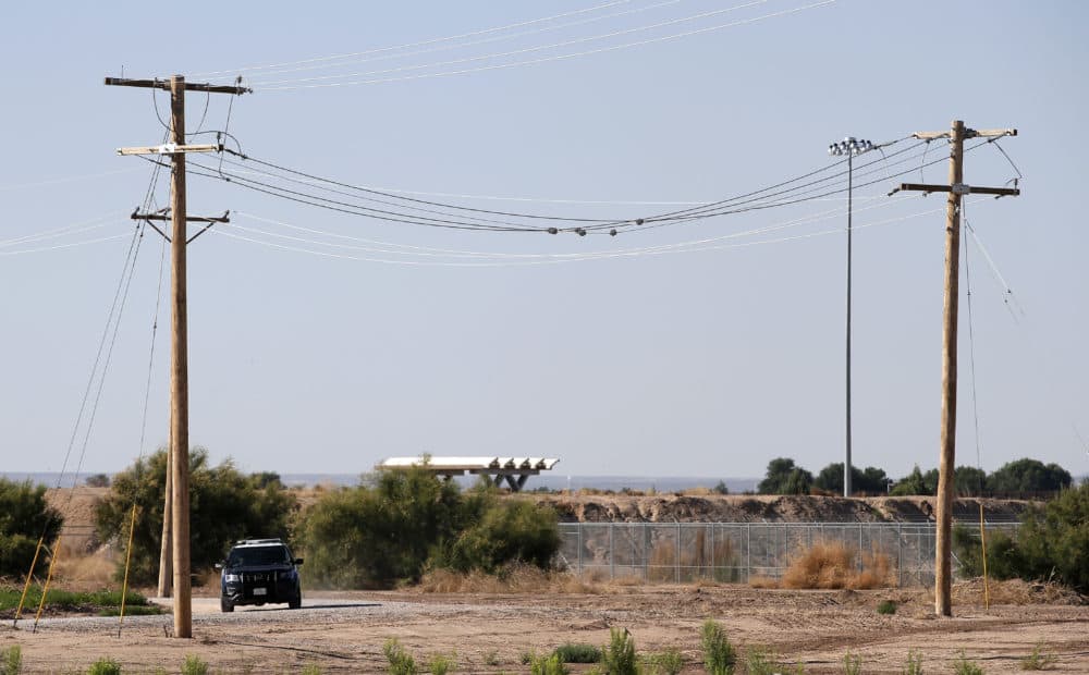 A vehicle of the El Paso county Sheriff office patrols outside the holding facility for immigrant children in Tornillo, Texas, near the Mexican border on Thursday, June 21, 2018. (Andres Leighton/AP)