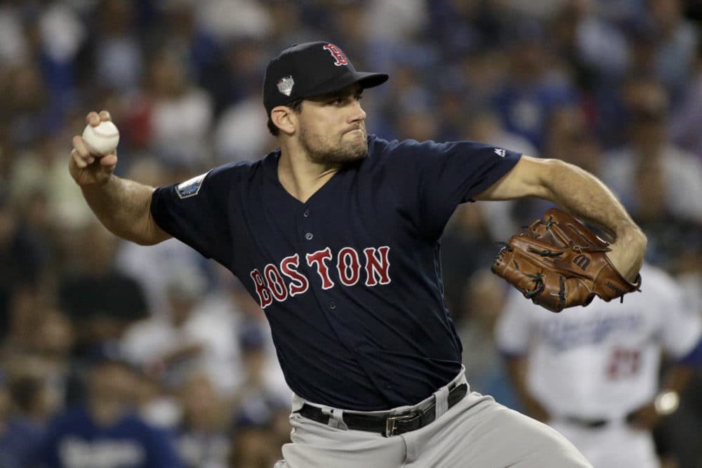 Boston Red Sox starting pitcher Nathan Eovaldi throws against the Los Angeles Dodgers during the 12th inning in Game 3 of the World Series baseball game on Friday, Oct. 26, 2018, in Los Angeles. (AP Photo/Jae C. Hong)