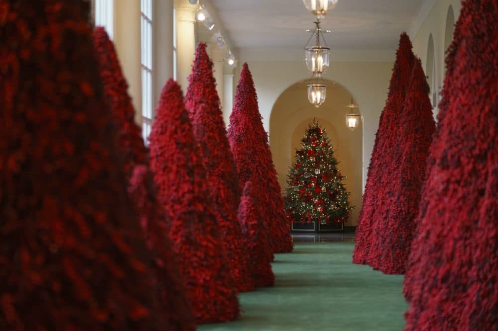 Topiary trees line the East colonnade during the 2018 Christmas Press Preview at the White House in Washington, Monday, Nov. 26, 2018. (Carolyn Kaster/AP)