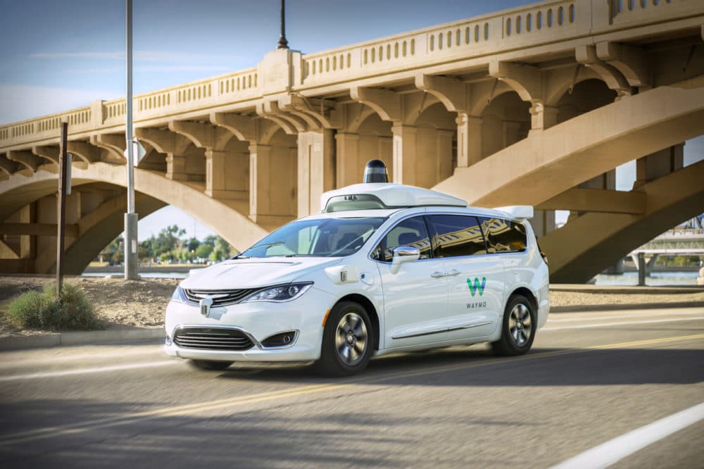 This undated photo provided by Waymo shows its self-driving minivan. Google's self-driving car spinoff is finally ready to try to profit from its nearly decade-old technology. Waymo introduced a small-scale ride-hailing service in the Phoenix area Wednesday, Dec. 4, 2018, that will include a human behind the wheel in case the robotic vehicles malfunction. (Waymo via AP)