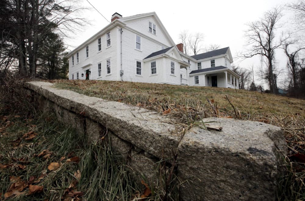In this Thursday, Dec. 13, 2018 photo a wall stands near the home where Sarah Clayes lived, in Framingham, Mass., after leaving Salem, Mass., following the 1692 witch trials. Clayes was jailed during the witch trials but was freed in 1693 when the hysteria died down. (Steven Senne/AP)