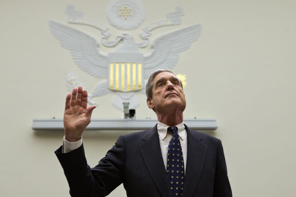FBI Director Robert Mueller is sworn in on on Capitol Hill in Washington, Thursday, June 13, 2013, prior to testifying before the House Judiciary Committee as it holds an oversight hearing on the FBI. (J. Scott Applewhite/AP)