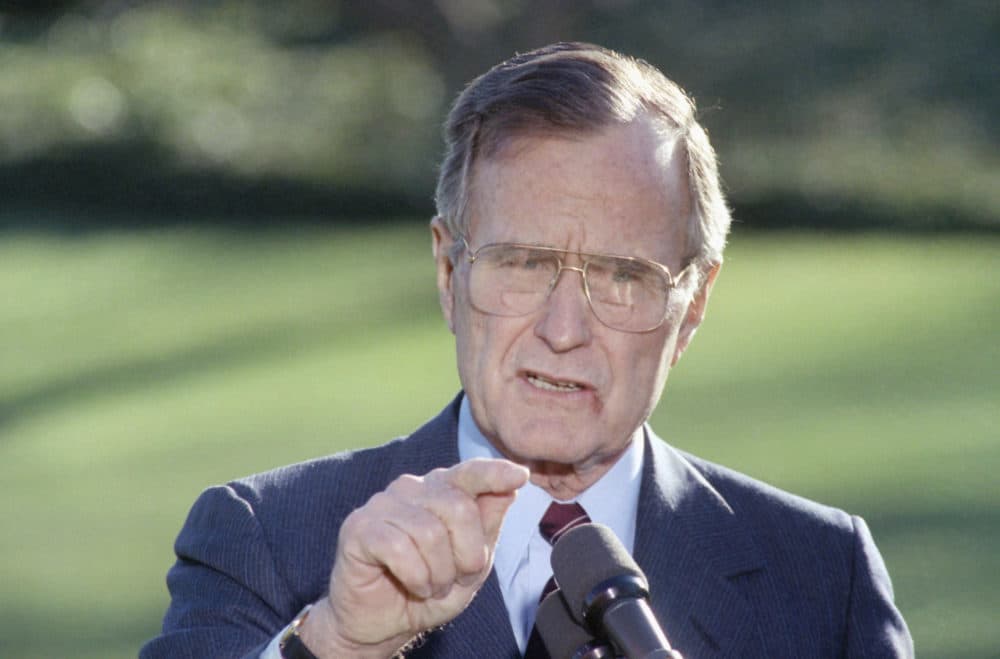 U.S. President George H. Bush makes a statement at the White House, Friday, Dec. 14, 1990. (Barry Thumma/AP)