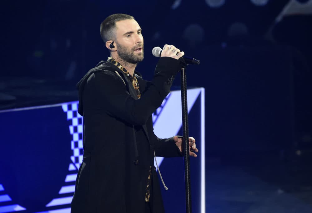 Singer Adam Levine performs with Maroon 5 during the 2018 iHeartRadio Music Awards. (Chris Pizzello/Invision/AP)