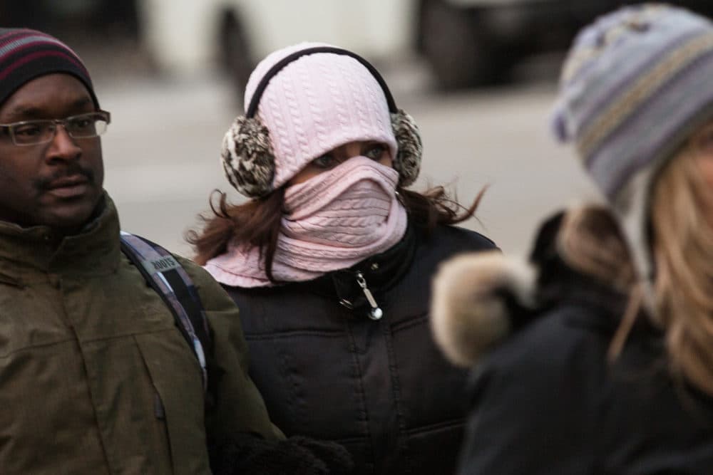A woman bundles up against the cold in New York City on Jan. 8, 2014, after a polar vortex descended from the Arctic on much of the country. (Andrew Burton/Getty Images)