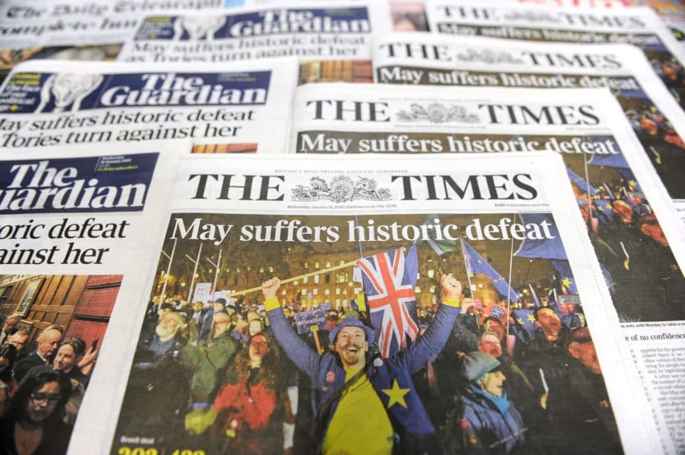 An arrangement of daily newspapers photographed in London on Jan. 16, 2019, shows front pages reporting on the U.K. Parliament's rejection of the government's Brexit deal. (Daniel Sorabji/AFP/Getty Images)