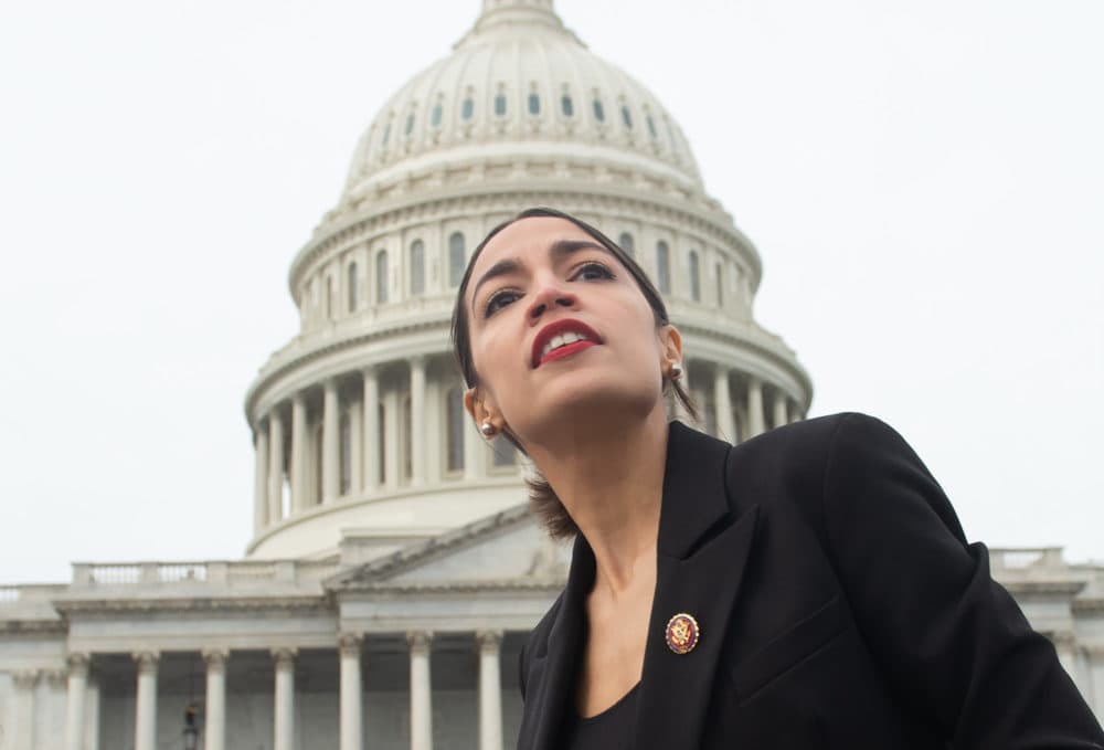 U.S. Rep. Alexandria Ocasio-Cortez (D-N.Y.) leaves a photo opportunity with female Democratic members of the 116th U.S. House of Representatives outside the U.S. Capitol in Washington, D.C., Jan. 4, 2019. (Saul Loeb/AFP/Getty Images)
