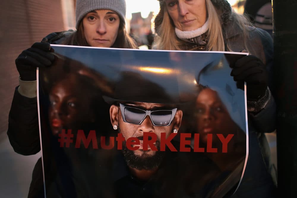 Demonstrators gather near the studio of singer R. Kelly to call for a boycott of his music, after allegations of sexual abuse against young girls were raised on the highly rated Lifetime miniseries &quot;Surviving R. Kelly,&quot; on Jan. 9, 2019 in Chicago. (Scott Olson/Getty Images)