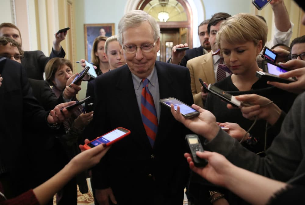 Senate Majority Leader Mitch McConnell (R-Ky.) smiles while talking with reporters following remarks on the Senate floor after an announced end to the partial government shutdown at the U.S. Capitol on Jan. 25, 2019 in Washington, D.C. (Win McNamee/Getty Images)