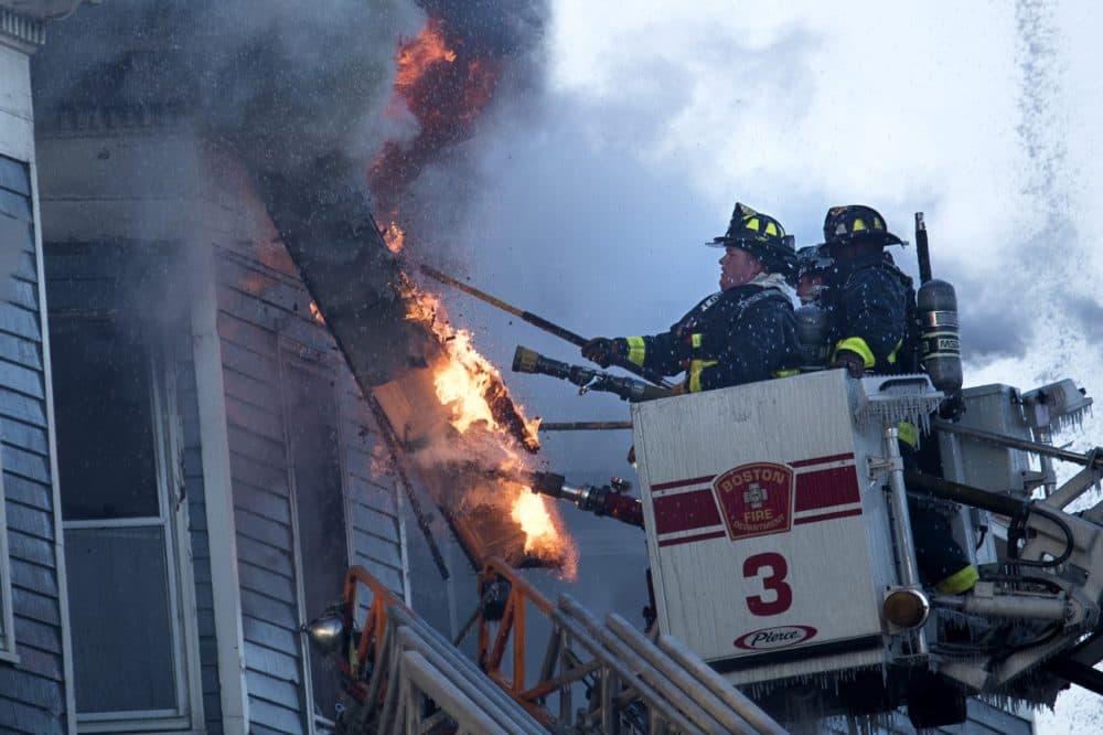Boston firefighters battle a Charlestown blaze in late 2016. (Jesse Costa/WBUR)