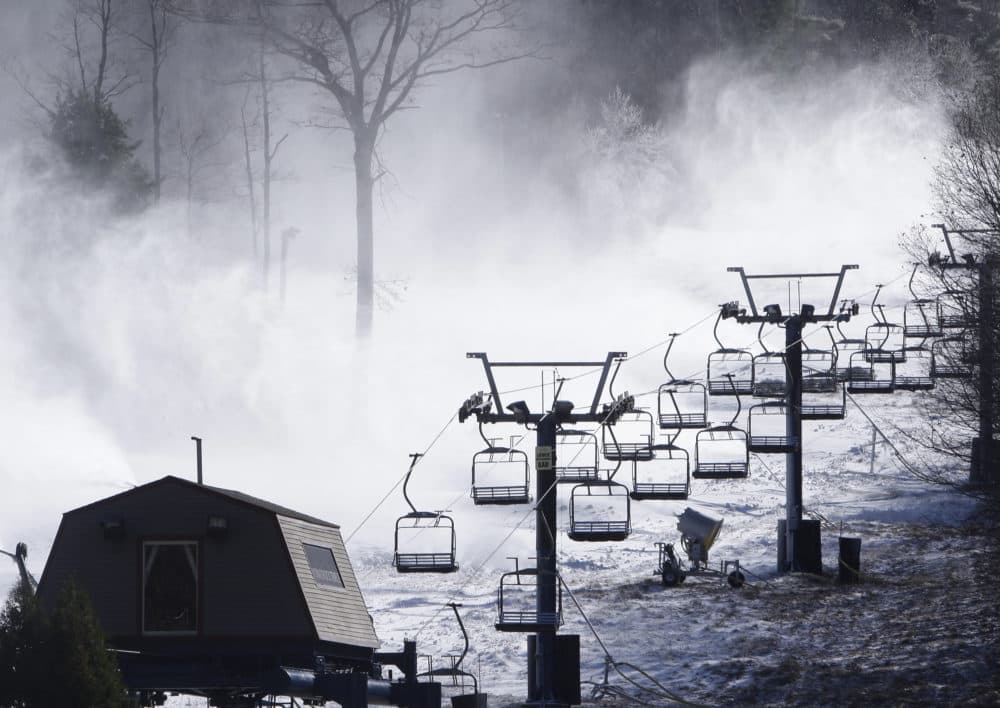 Snow guns shoot powder over a trail at Wachusett Mountain ski area in Princeton, Mass., in this 2008 file photo. (Charles Krupa/AP)