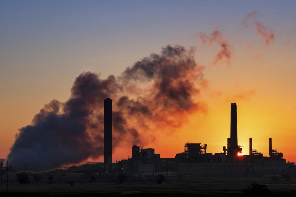 In this July 27, 2018 photo, the Dave Johnson coal-fired power plant is silhouetted against the morning sun in Glenrock, Wyo. (J. David Ake/AP)