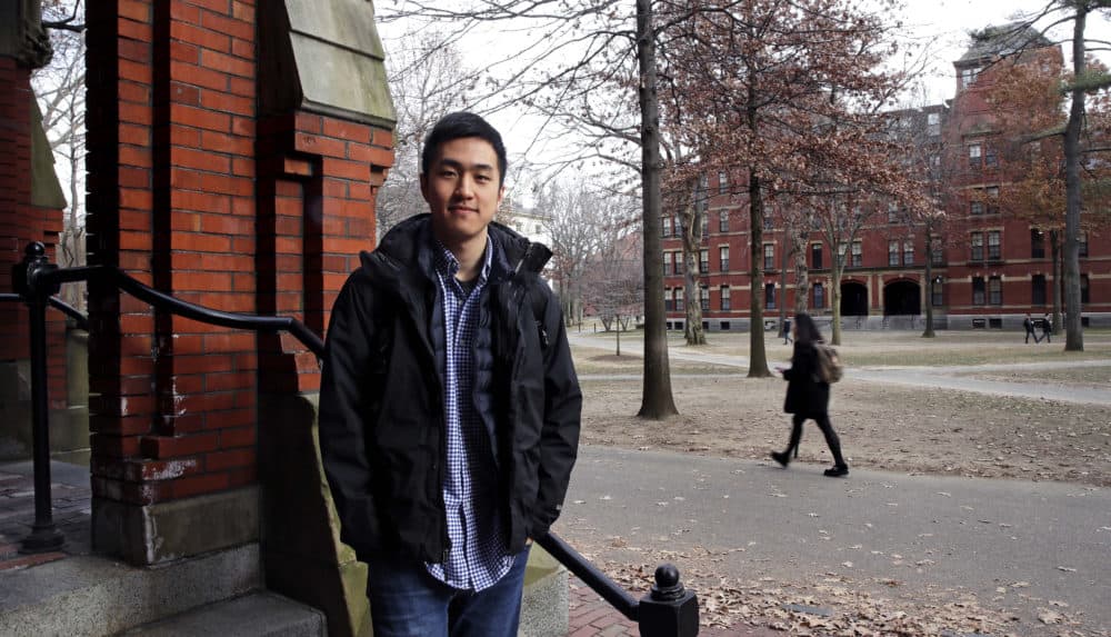 Harvard University graduate Jin K. Park, who holds a degree in molecular and cellular biology, poses at Harvard Yard in Cambridge, Mass., Thursday, Dec. 13, 2018. Park, who was named a Rhodes Scholar along with 30 other Americans in November, entered the U.S. illegally as a child, moving to Queens borough of New York City with his family. The undocumented student, who participates in the Deferred Action for Childhood Arrivals program (DACA), is not sure if he'll be allowed back in the U.S. after his studies in the United Kingdom. (Charles Krupa/AP)