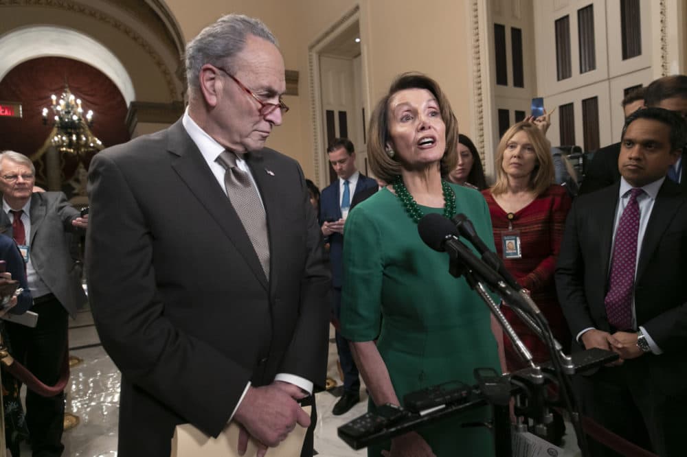Senate Minority Leader Chuck Schumer, D-N.Y., and House Democratic Leader Nancy Pelosi of California, the speaker-designate for the new Congress, talk to reporters as a revised spending bill is introduced in the House that includes $5 billion demanded by President Donald Trump for a wall along the U.S.-Mexico border, as Congress tries to avert a partial shutdown, in Washington, Thursday, Dec. 20, 2018. (J. Scott Applewhite/AP)