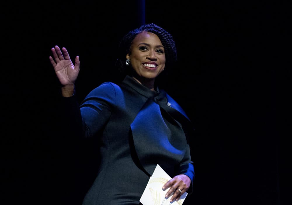 Ayanna Pressley waves to the audience during a swearing-in ceremony of the Congressional Black Caucus. (Jose Luis Magana/AP)