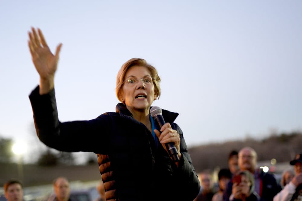 Sen. Elizabeth Warren, D-Mass, addresses an overflow crowd outside an organizing event at McCoy's Bar Patio and Grill in Council Bluffs, Iowa, Friday, Jan. 4, 2019. (Nati Harnik/AP)