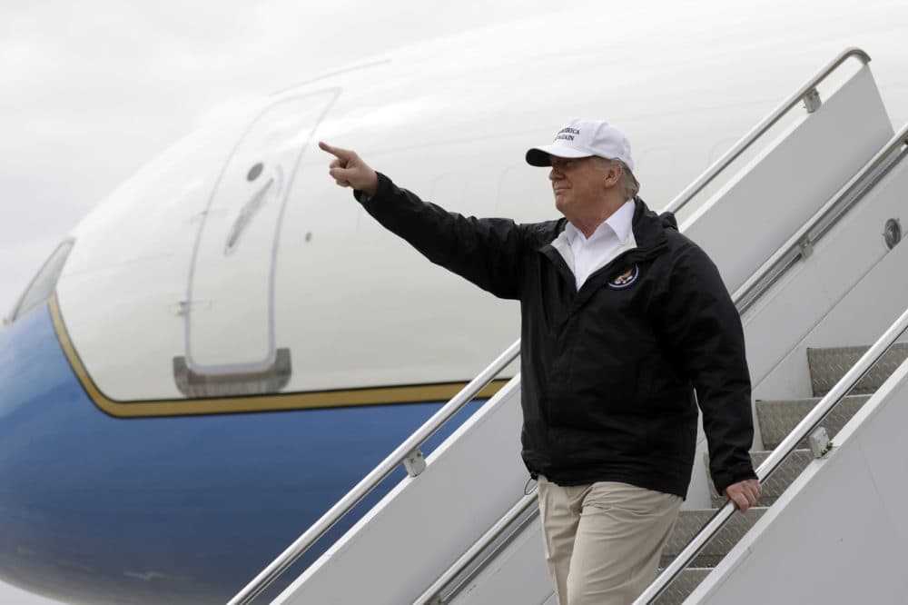 President Donald Trump gestures after arriving at McAllen International Airport for a visit to the southern border, Thursday, Jan. 10, 2019, in McAllen, Texas. (Evan Vucci/AP)