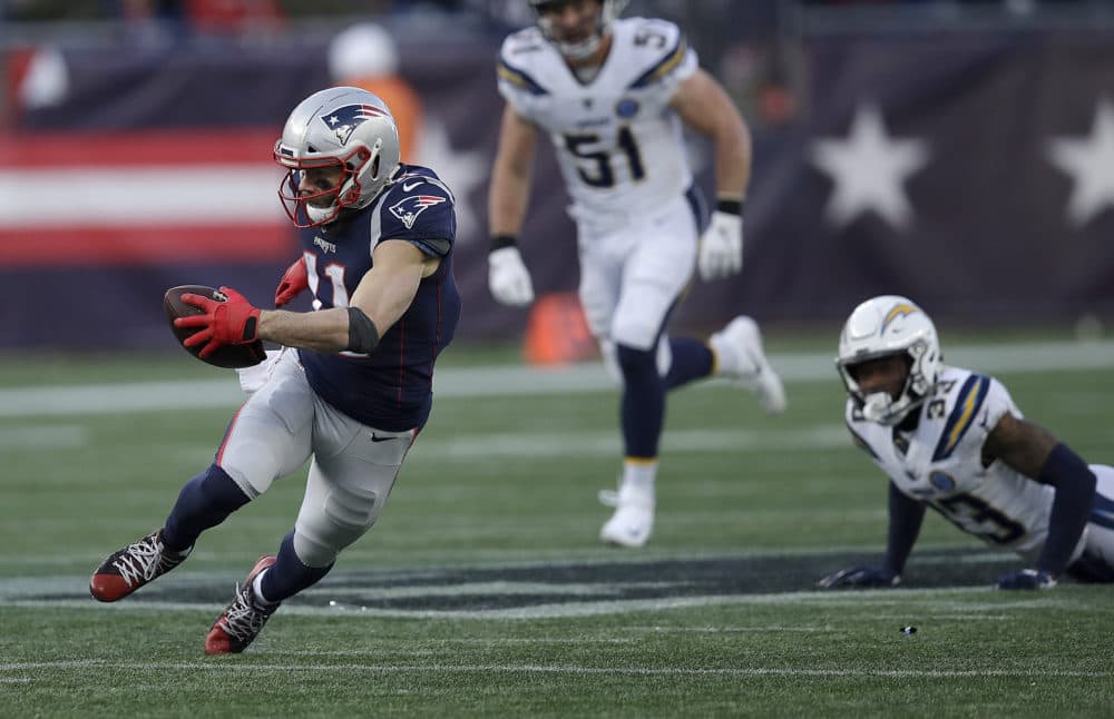 New England Patriots wide receiver Julian Edelman (11) runs after catching a pass against the Los Angeles Chargers during the second half of an NFL divisional playoff football game, Sunday, Jan. 13, 2019, in Foxborough, Mass. (Charles Krupa/AP)