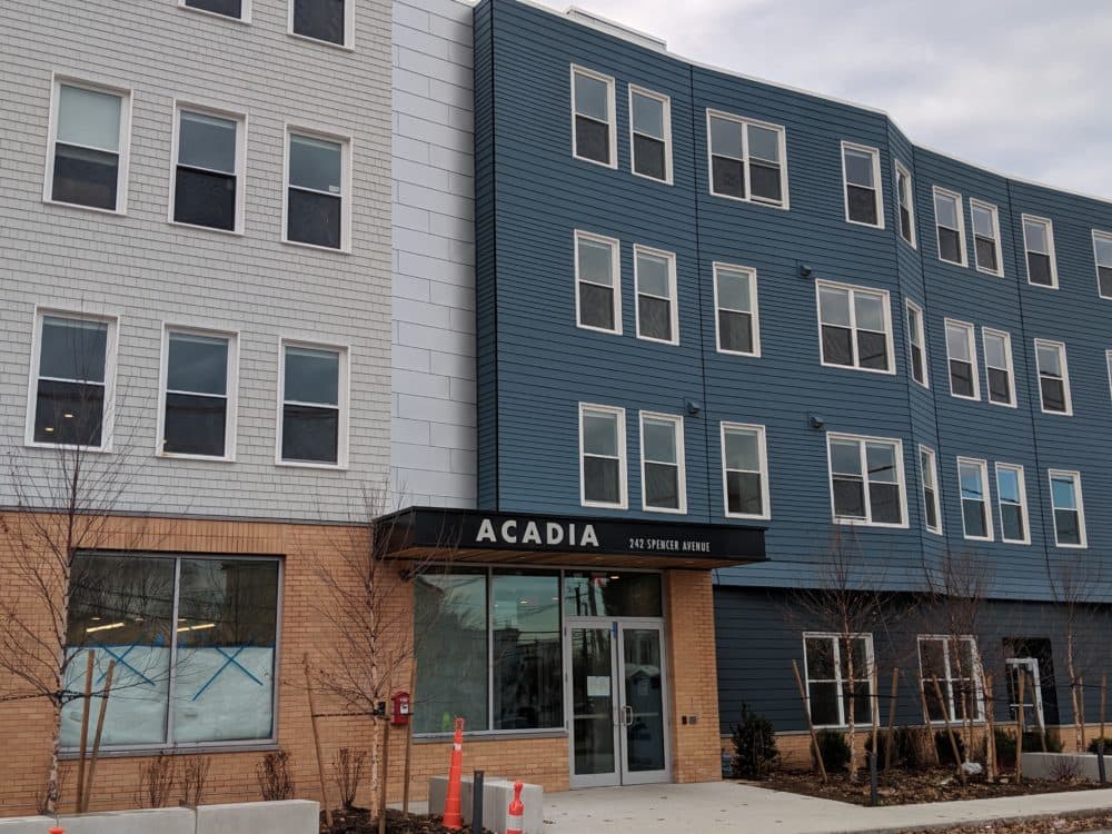 Rising housing costs and new upscale apartment buildings have local residents concerned about displacement and gentrification. The new Acadia apartment complex in Chelsea is ready to house 34 families. (Courtesy of Neighborhood Developers)
