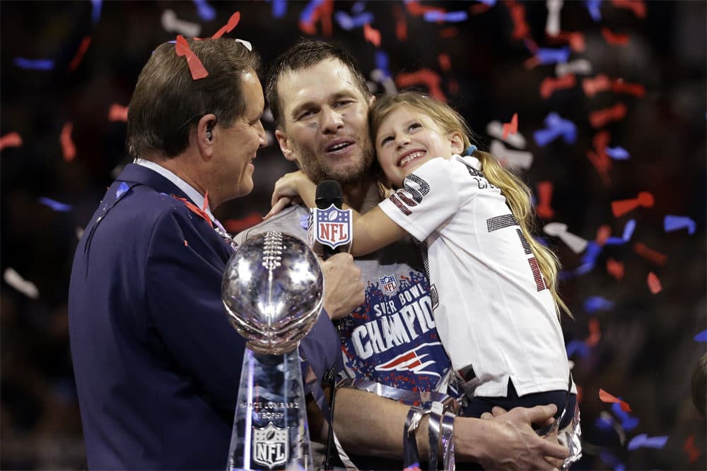 New England Patriots' Tom Brady holds his daughter, Vivian, after the NFL Super Bowl 53 football game against the Los Angeles Rams, Sunday, Feb. 3, 2019, in Atlanta. The Patriots won 13-3. (AP Photo/Mark Humphrey)