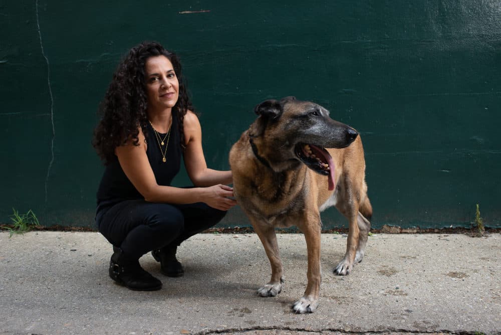 Rebecca Frankel and Dyngo, a retired military working dog who lives with Frankel in Washington, D.C. (Courtesy of Susana Raab)