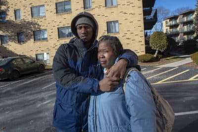 Malique Gordon, left, lives with his mother, Maureen Nugent, who receives a Section 8 housing voucher. They've had a mixed experience with the program. (Jesse Costa/WBUR)