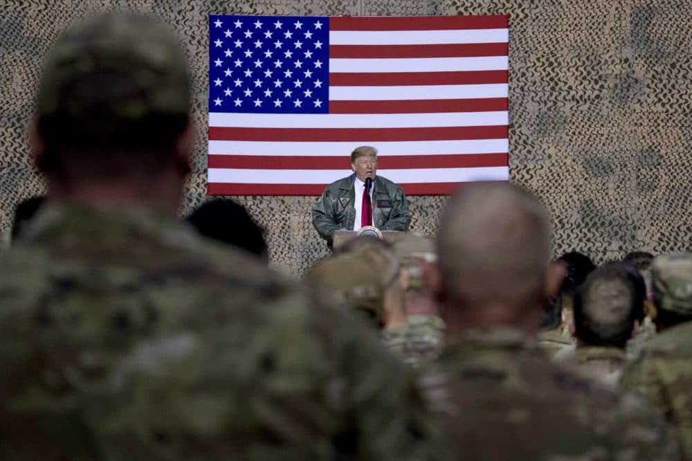 President Donald Trump speaks at a hangar rally at Al Asad Air Base, Iraq, Wednesday, Dec. 26, 2018. (Andrew Harnik/AP)