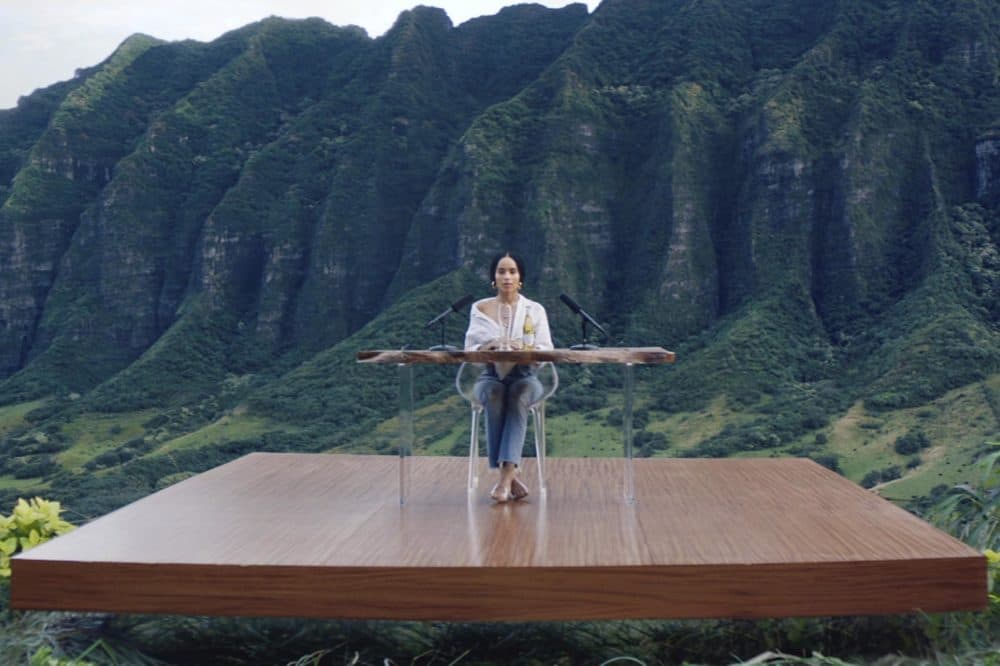 This image from video provided by Michelob shows a frame from their 2019 Super Bowl commercial for Michelob Ultra Pure Gold. The ad features the actress Zoe Kravitz using techniques for autonomous sensory meridian response, or ASMR. It is described as a tingly euphoric response, usually starting on the head and scalp, and sometimes spreading down the neck, arms or back. (Michelob ULTRA via AP)