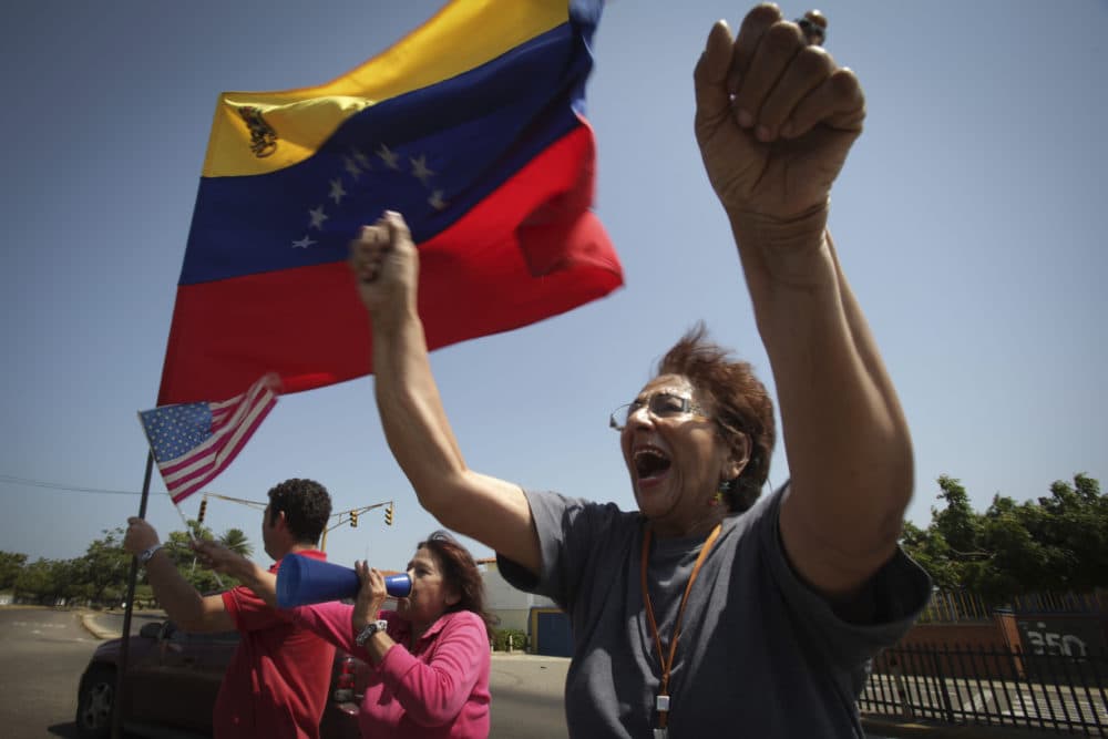 A woman chants anti-government slogans in a walkout against President Nicolas Maduro, in Maracaibo, Venezuela, Wednesday, Jan. 30, 2019. (Boris Vergara/AP)