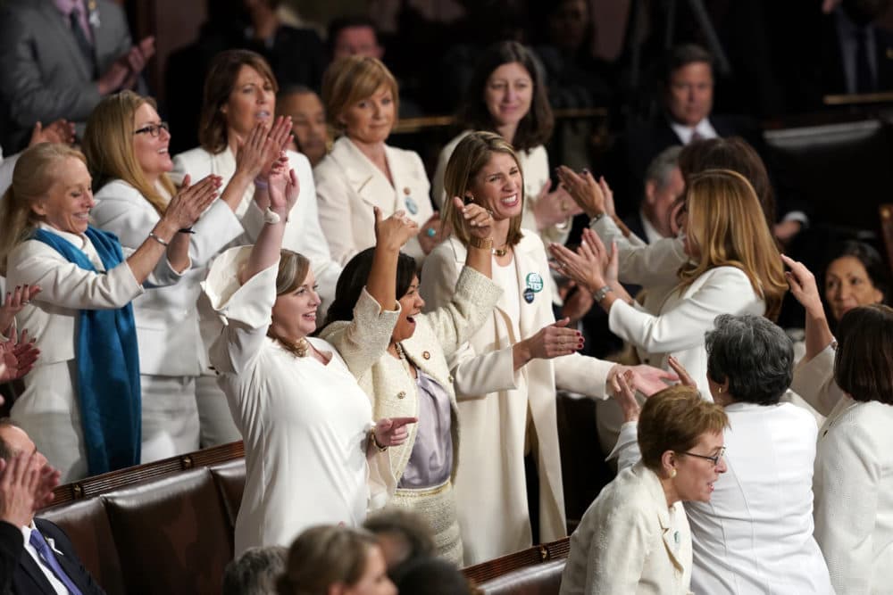 Members of Congress cheer, including Rep. Lori Trahan (center right), after President Donald Trump acknowledges more women in Congress during his State of the Union address to a joint session of Congress on Capitol Hill in Washington, Tuesday, Feb. 5, 2019. Carolyn Kaster/AP)