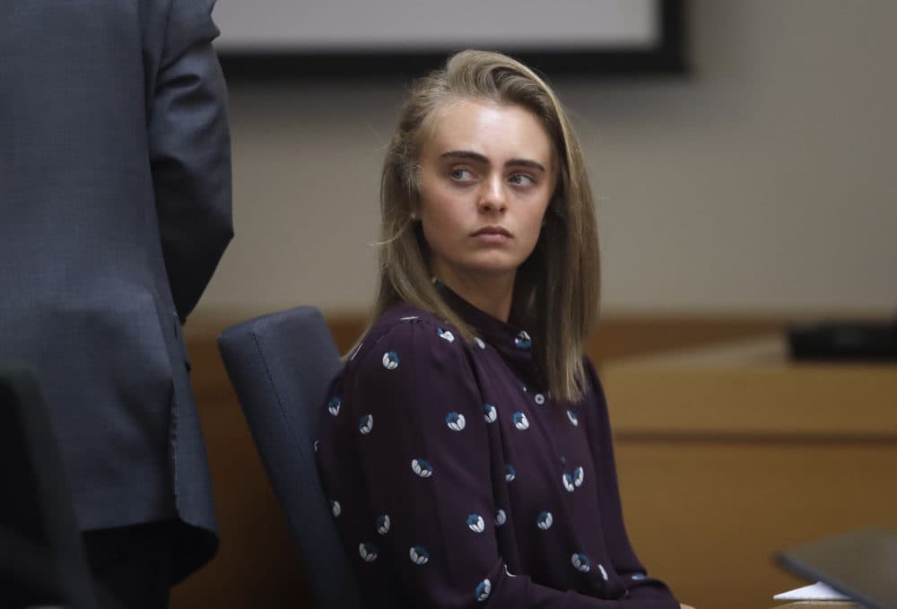 In this June 8, 2017 file photo, Michelle Carter sits in Taunton District Court in Taunton, Mass. Carter was convicted of involuntary manslaughter and sentenced to prison for encouraging 18-year-old Conrad Roy, III to kill himself in July 2014. The Supreme Judicial Court of Massachusetts is expected to release it's ruling in the case on Wednesday, Feb. 6, 2019. Her sentence was put on hold while the court reviewed the case and the defense argument that her actions were not criminal. (Charles Krupa via AP Pool/ AP File Photo)