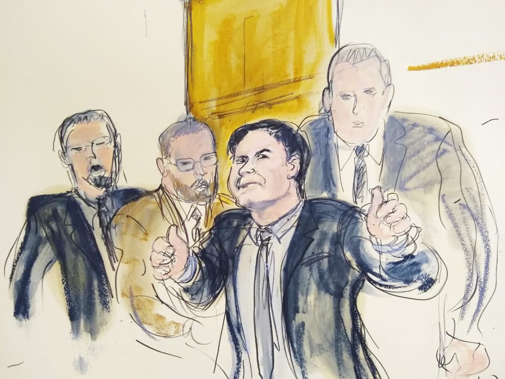 In this courtroom drawing, Joaquín &quot;El Chapo&quot; Guzmán, second from right, accompanied by U.S. Marshals, gestures a &quot;thumbs up&quot; to his wife, Emma Coronel Aispuro, as he leaves the courtroom on Feb. 12 in New York. (Elizabeth Williams via AP)