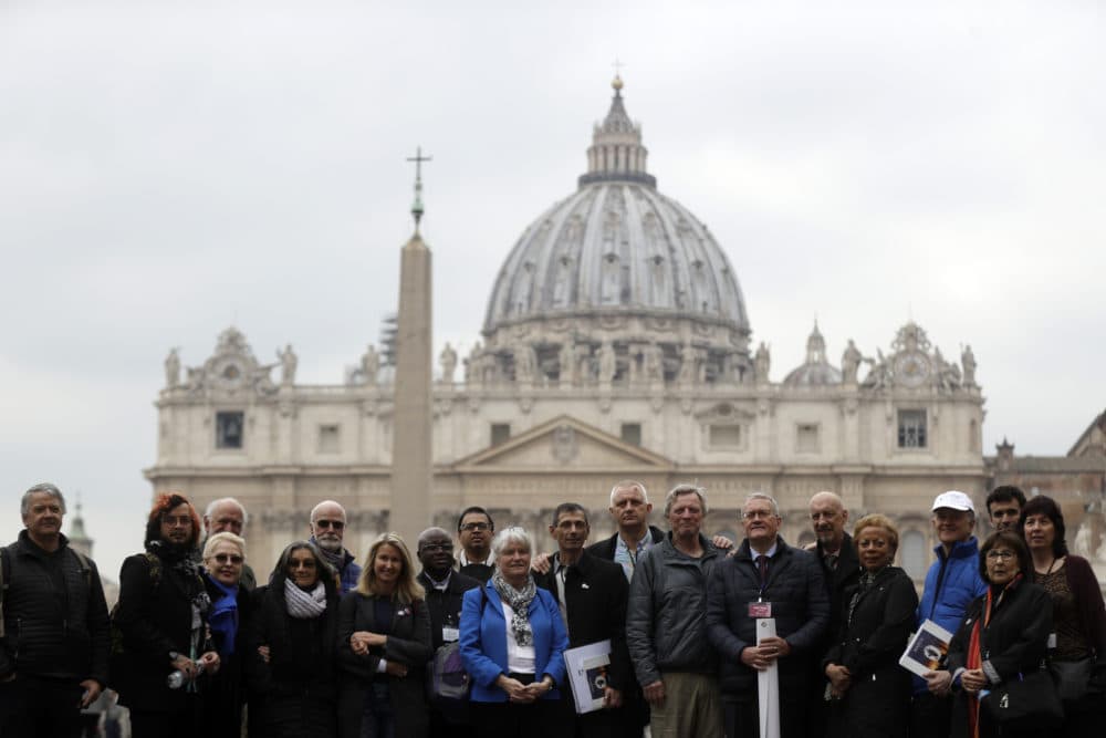 Members of the Ending of Clergy Abuse organization and survivors of clergy sex abuse pose for photographers outside St. Peter's Square, at the Vatican, Monday, Feb. 18, 2019. (Gregorio Borgia/AP)