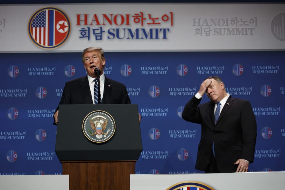 President Donald Trump speaks as Secretary of State Mike Pompeo looks on during a news conference after a summit with North Korean leader Kim Jong Un. (Evan Vucci/AP)