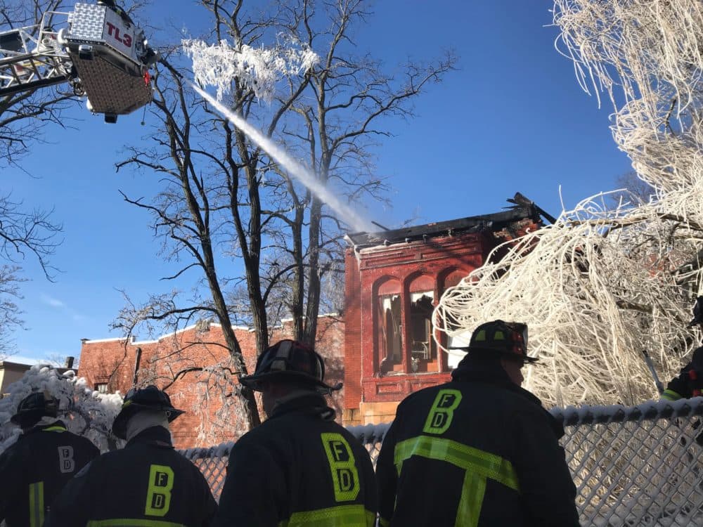 A six-alarm fire tore through the Holy Mt. Zion Church in Roxbury on Saturday, Jan. 2, 2019. (Quincy Walters/WBUR)