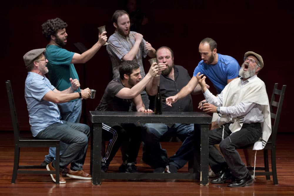 Steven Skybell, right, as Tevye, rehearses with the National Yiddish Theatre Folksbiene cast of a Yiddish-language version of &quot;Fiddler on the Roof,&quot; at the at the Museum of Jewish Heritage in New York on June 19, 2018. (Richard Drew/AP)