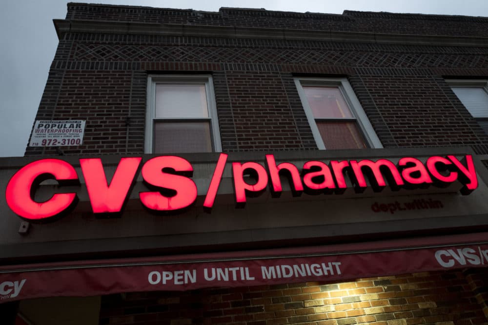 FILE- This Dec. 3, 2017, file photo shows a CVS Pharmacy in the Brooklyn borough of New York. CVS Health reports earnings Wednesday, Aug. 8, 2018. (AP Photo/Mark Lennihan, File)