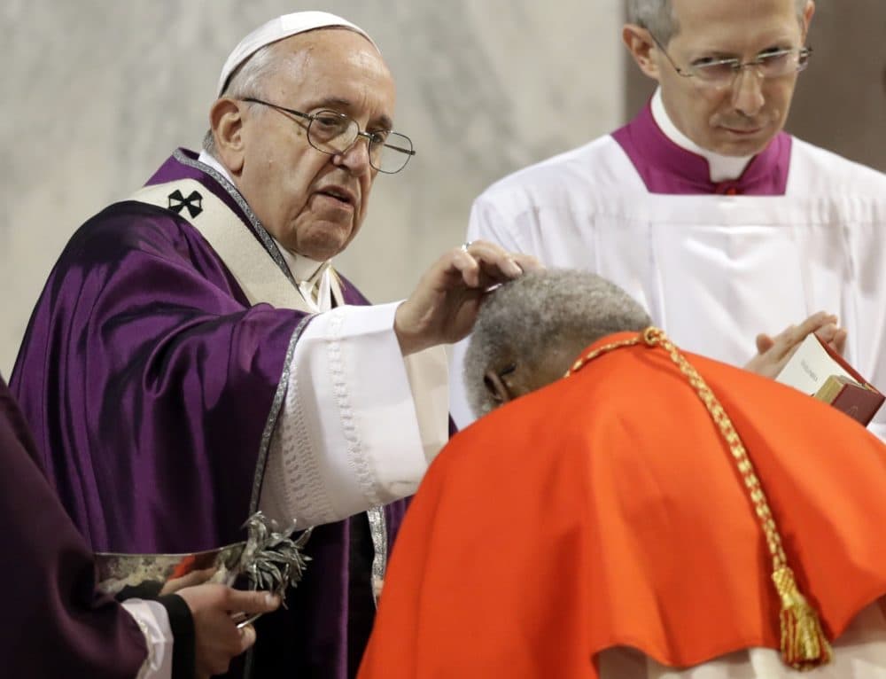 Pope Francis puts ashes on a cardinal's forehead, at the Basilica of Saint Sabina in Rome Wednesday, March 6, 2019. (Andrew Medichini/AP)