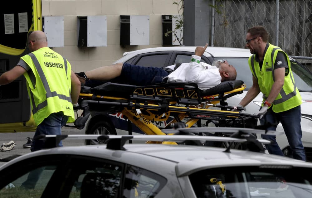 Ambulance staff take a man from outside a mosque in central Christchurch, New Zealand, Friday, March 15, 2019. (Mark Baker/AP)