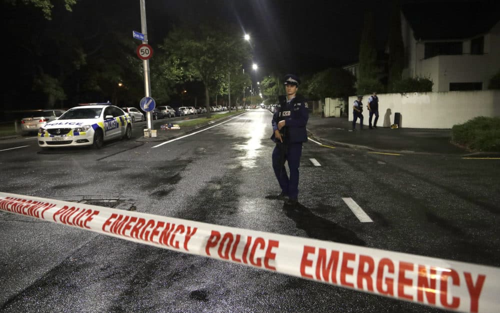 A police officer patrols near a mosque in central Christchurch, New Zealand Friday. (Mark Baker/AP)