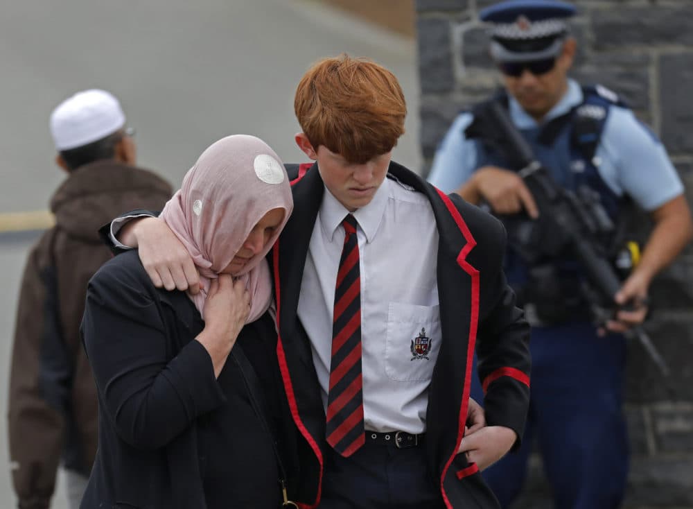 Mourners leave the cemetery after the burial service for a victim of the Friday March 15 mosque shootings at the Memorial Park Cemetery in Christchurch, New Zealand, Thursday, March 21, 2019. (Vincent Yu/AP)