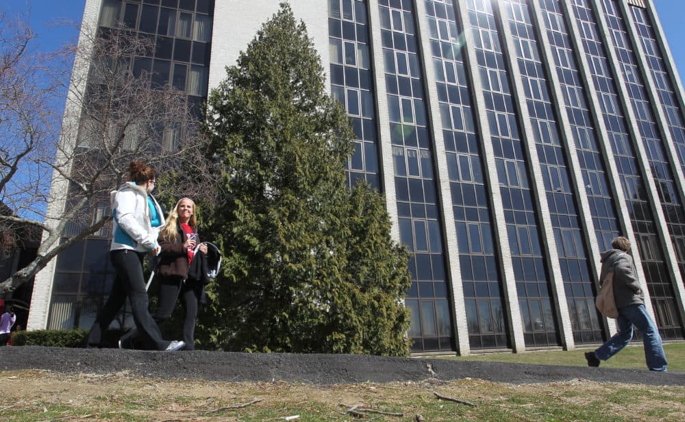 Students walk on the University of Rhode Island campus. (Stew Milne/AP)