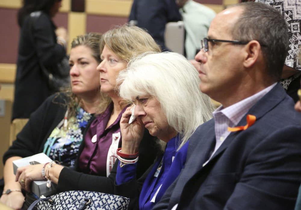 Family and friends of victims watch during an arraignment hearing for Nikolas Cruz -- the alleged shooter at Marjory Stoneman Douglas High School in Parkland, Fla. -- at the Broward County Courthouse in Fort Lauderdale, Fla., Wednesday, March 14, 2018. Cruz is accused of opening fire at the school on Feb. 14, 2018, killing 17 students and adults. (Amy Beth Bennett/South Florida Sun-Sentinel via AP, Pool)