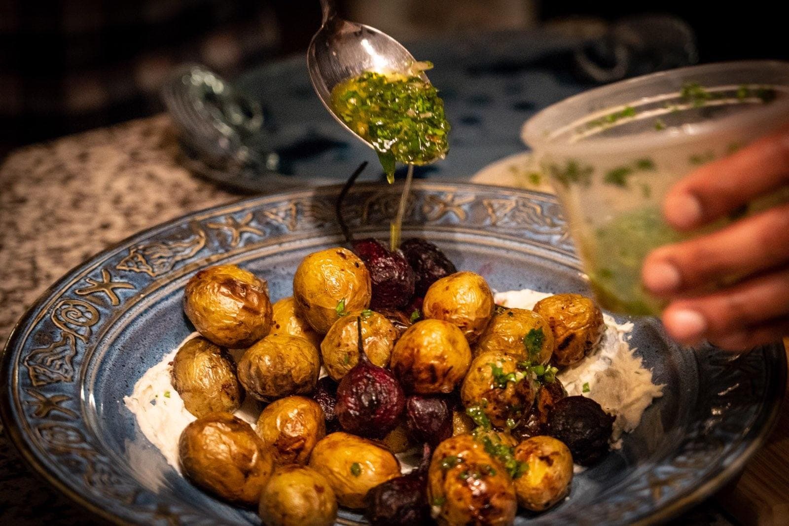 Blistered baby potatoes and beets cooked by Dope Dinners. The roasted baby Russian potatoes and baby beets are served with a medicated honey-whipped ricotta. (Courtesy)