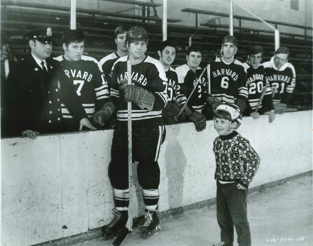 Ryan O'Neal dons his Harvard hockey uniform for the movie &quot;Love Story.&quot; Bill Cleary III is in foreground. (Courtesy Bill Cleary)